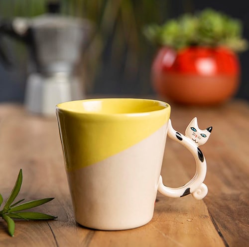 tasse avec anse coulee